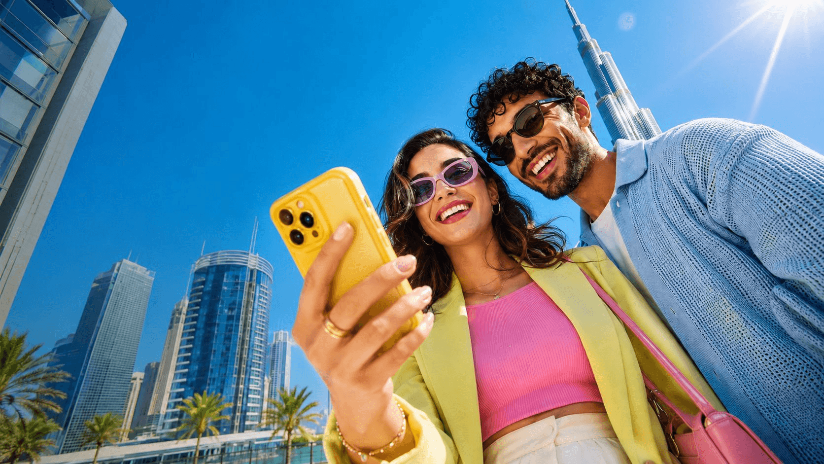Two friends out together, redeeming an offer on a phone
